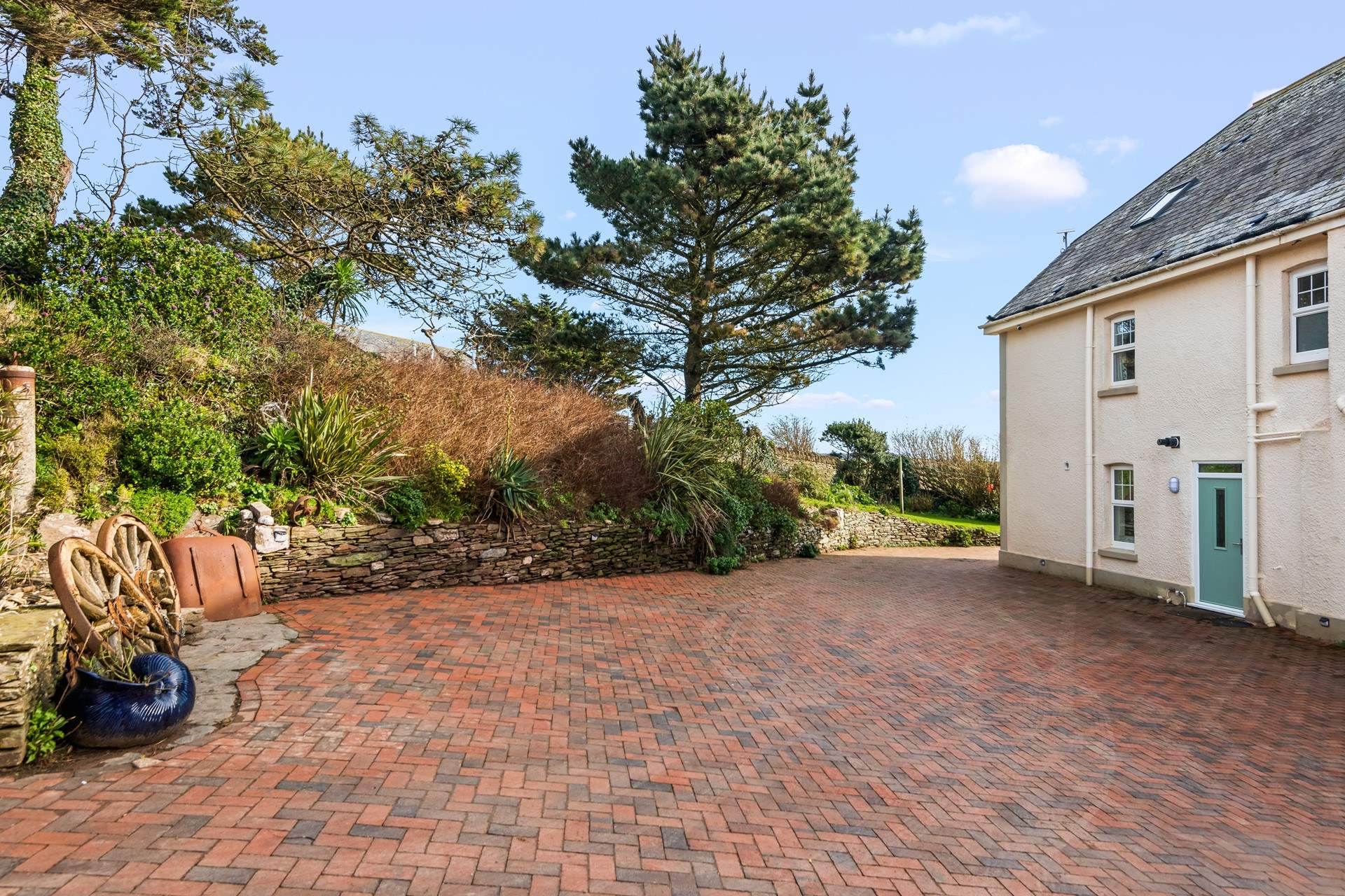 The courtyard and parking area for Mount Folly Farmhouse. Please park to the left of the building, down the side, your spaces will be designated.