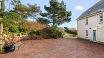 The courtyard and parking area for Mount Folly Farmhouse. Please park to the left of the building, down the side, your spaces will be designated.