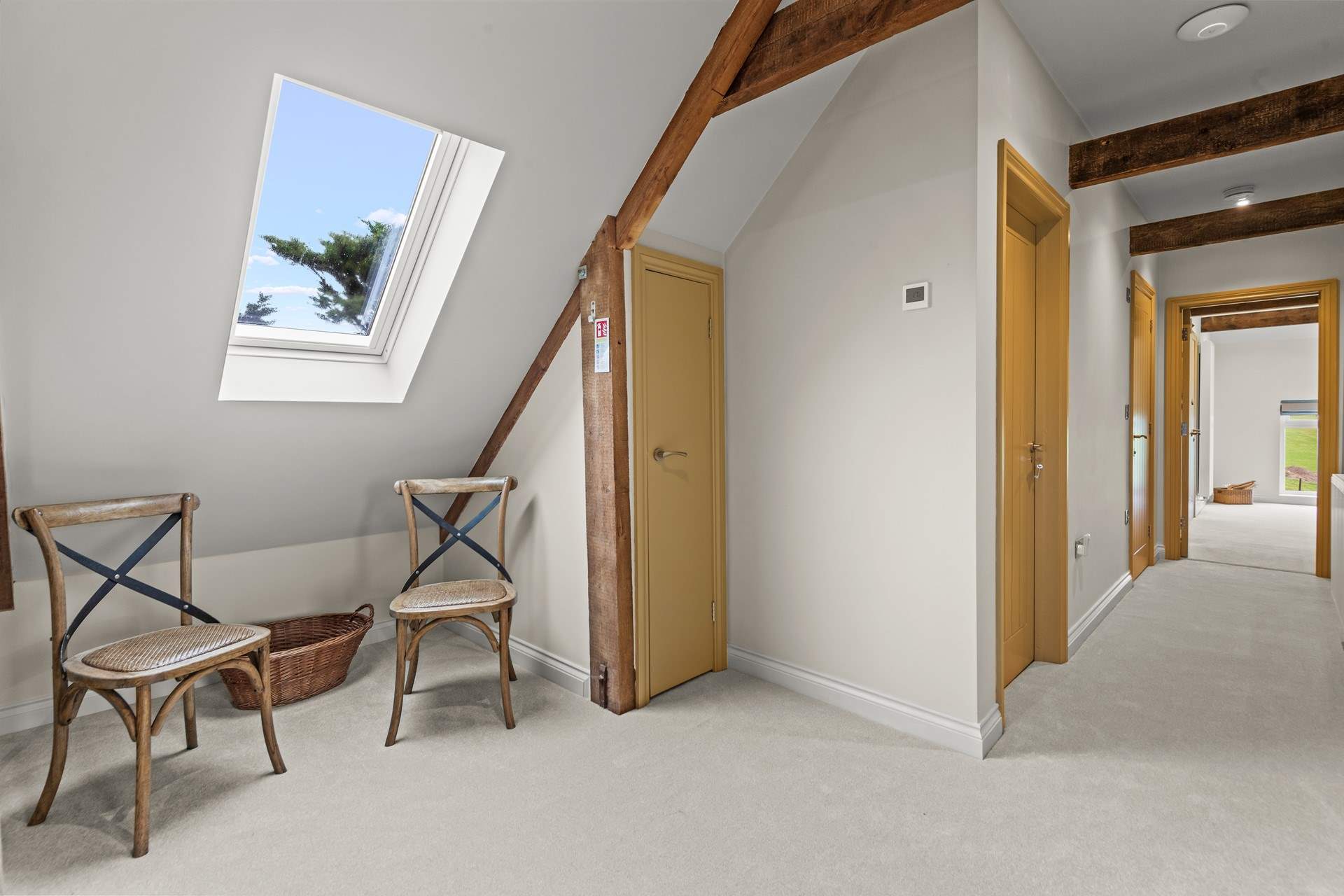 When it's time for bed, the three beautiful bedrooms are found down this spacious hallway.