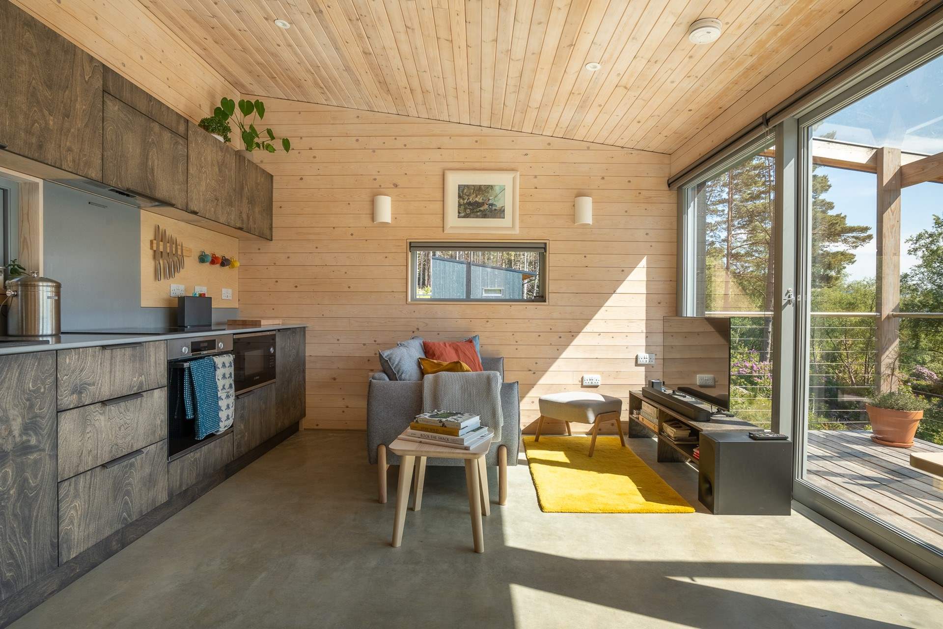 Timber-clad walls, organic textures and gentle pops of colour create a calm yet uplifting atmosphere.