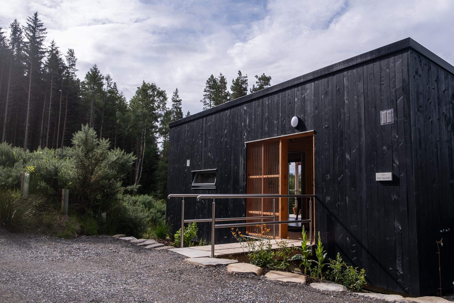 Dark, striking exteriors blend seamlessly into the Highland landscape.