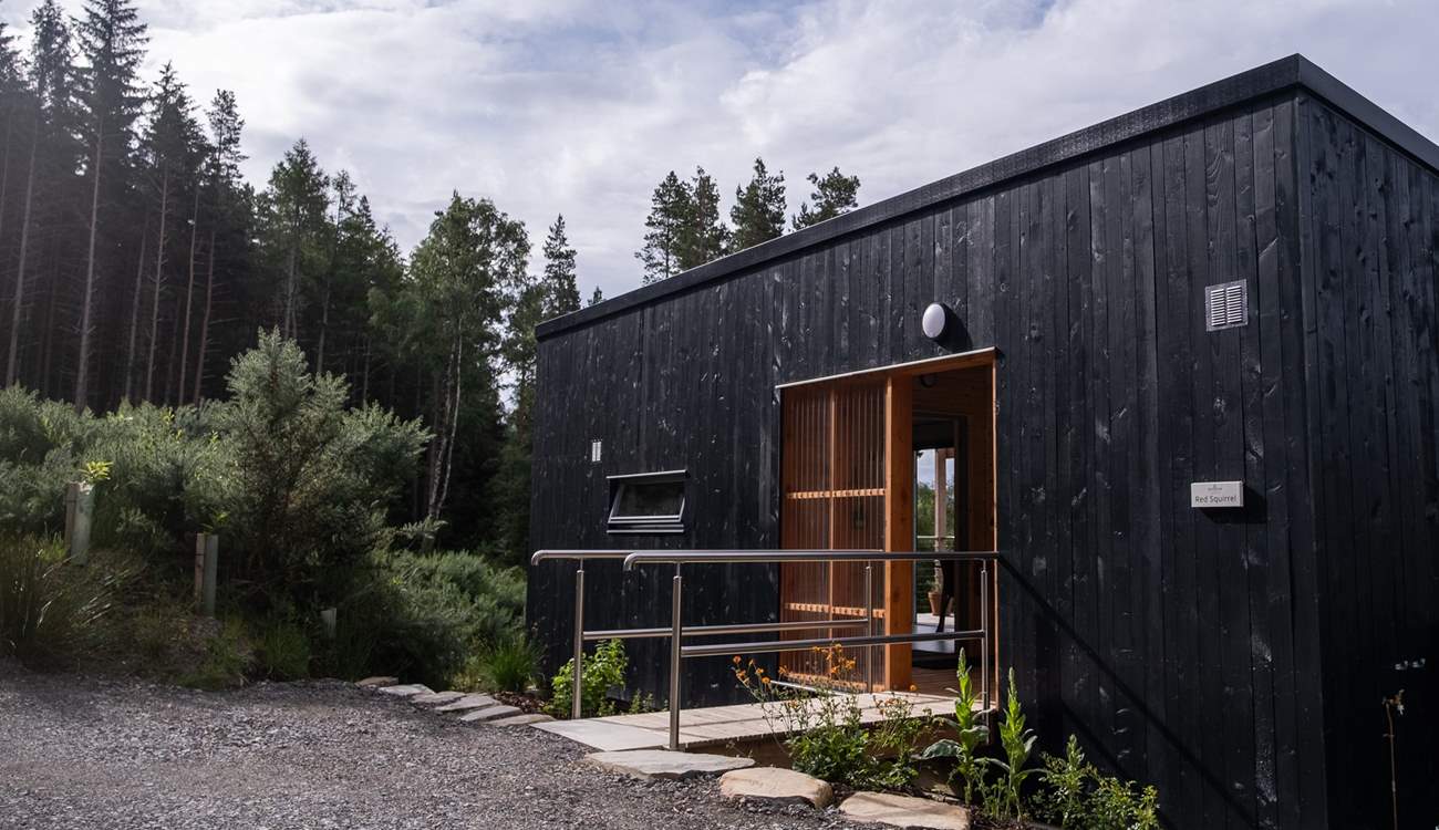 Dark, striking exteriors blend seamlessly into the Highland landscape.