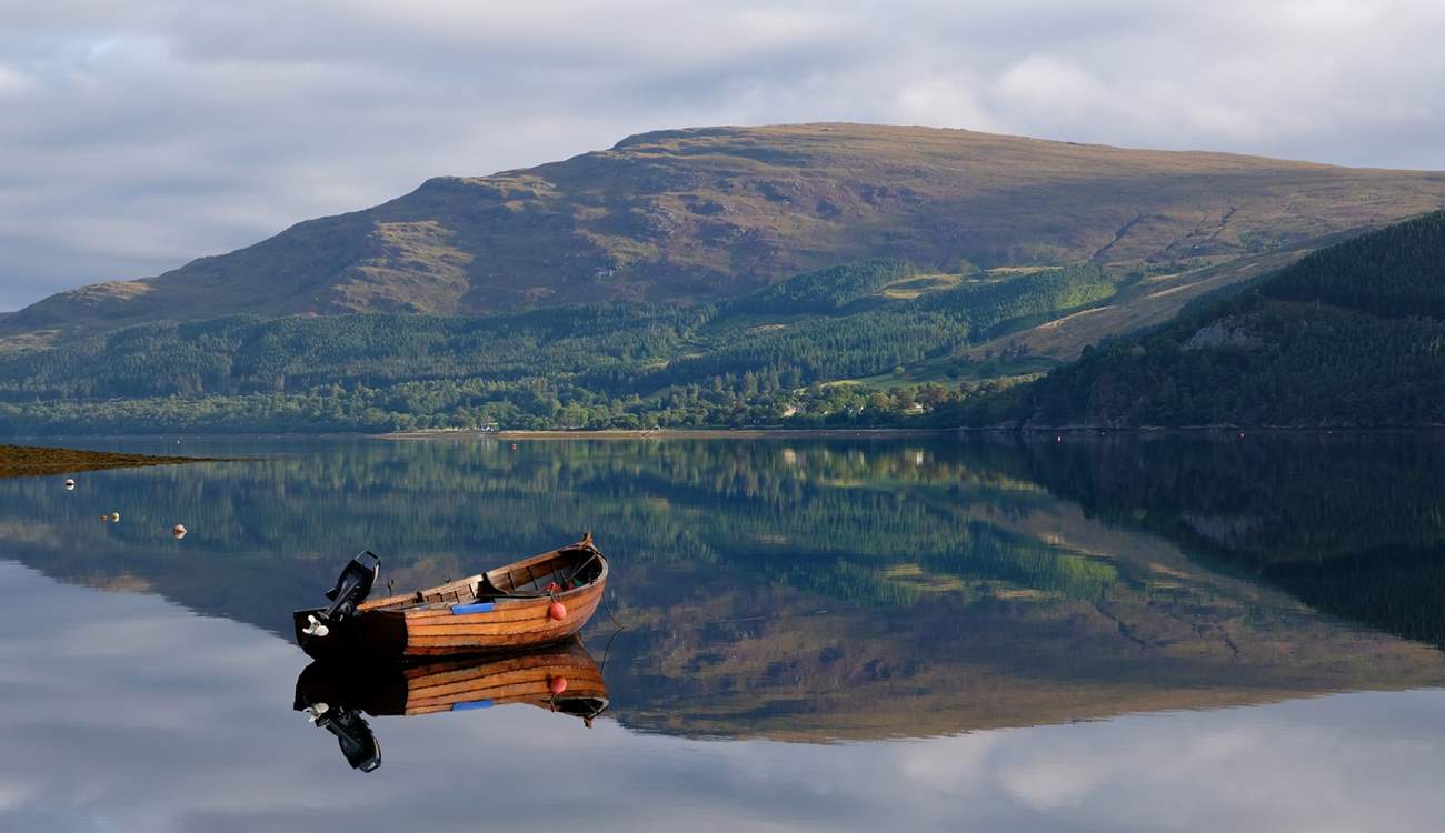 Explore remote sea inlets that carve through the coastline.
