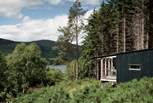 Set within a quiet woodland clearing on the shores of Loch Broom.
