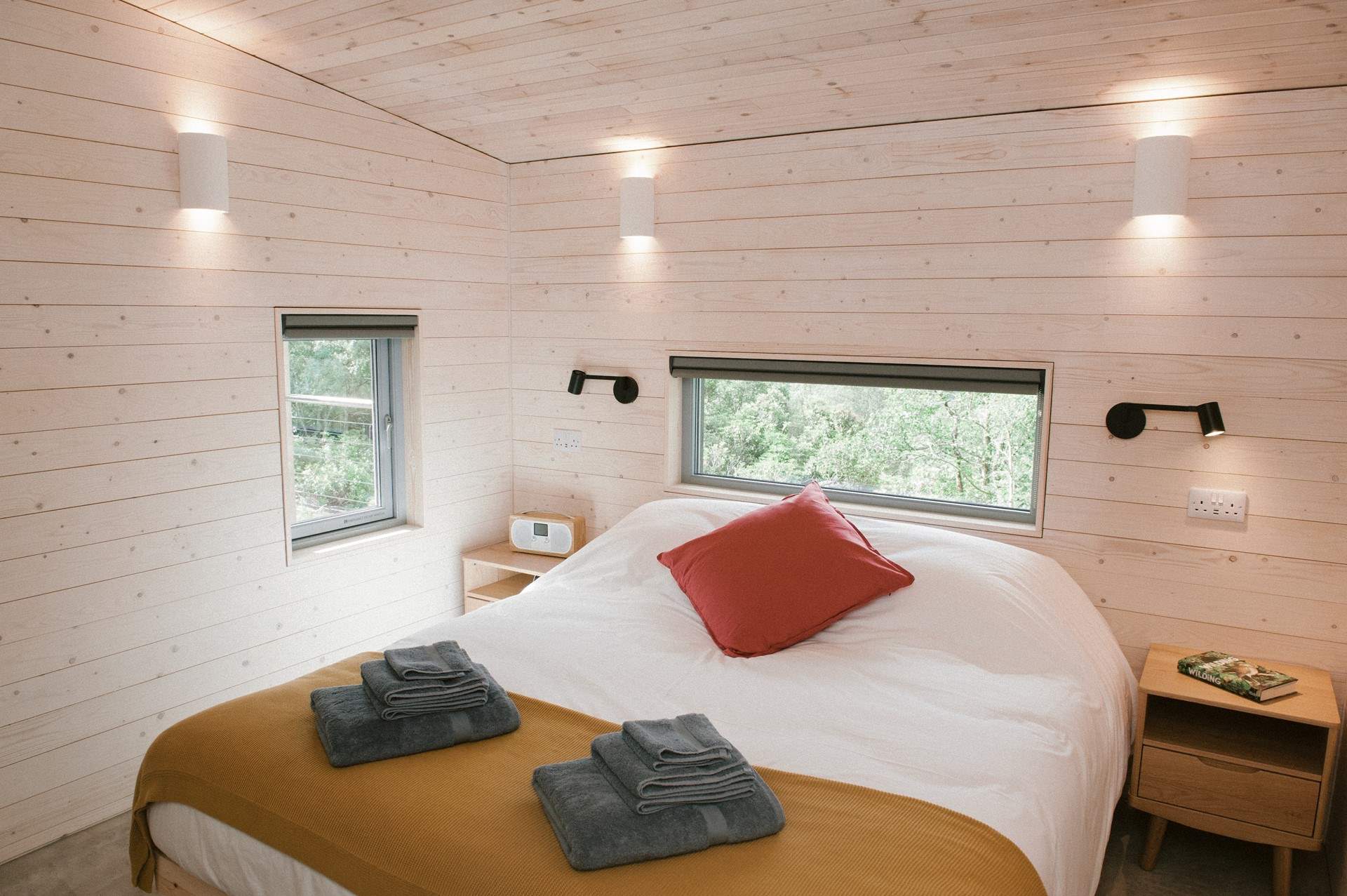 Gentle pops of colour create a calm yet uplifting atmosphere.