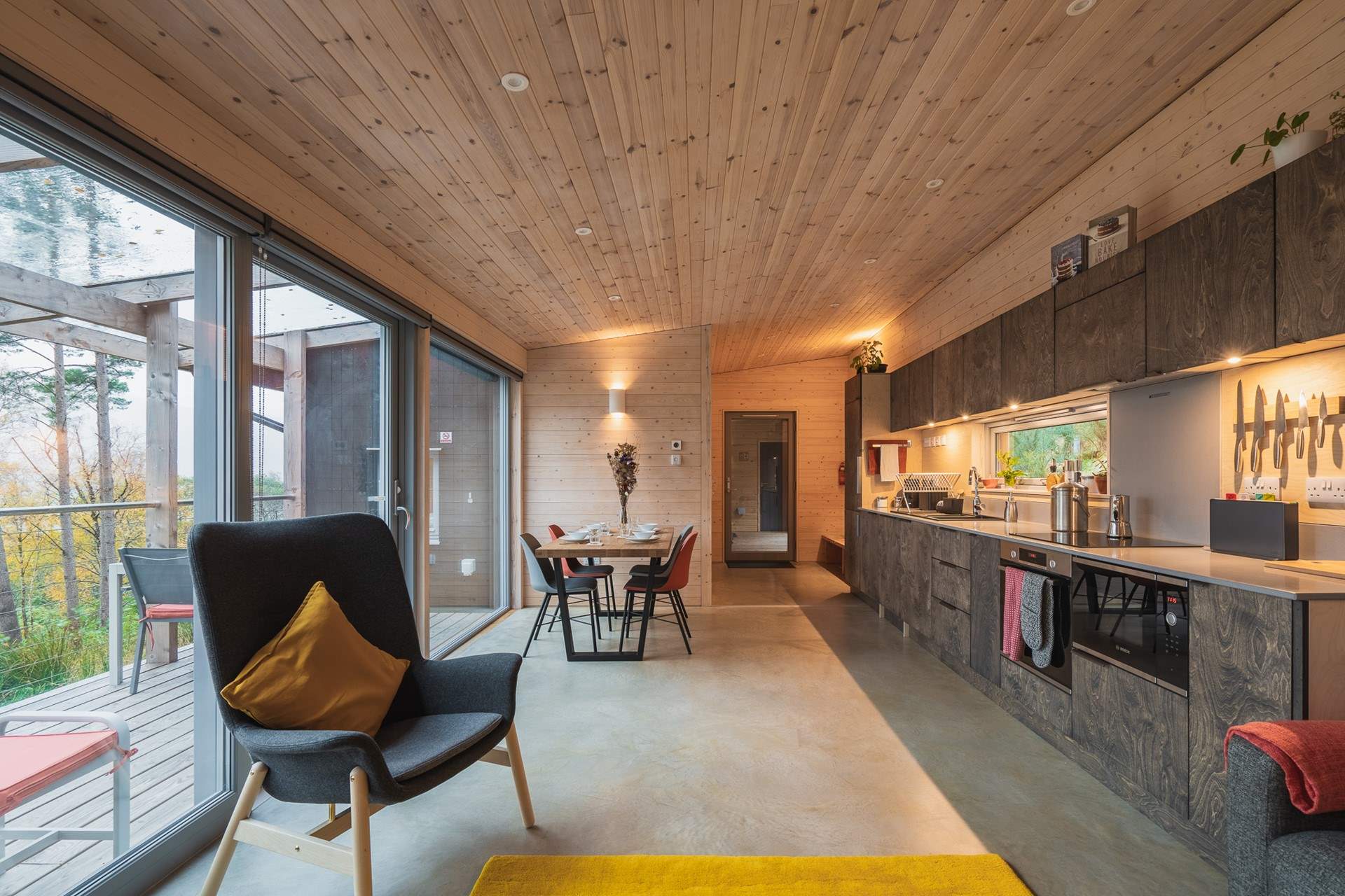 A spellbinding Scottish cabin hidden among the trees beside Loch Broom.