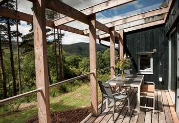 Enjoy alfresco meals with far-reaching views across the stunning surroundings.