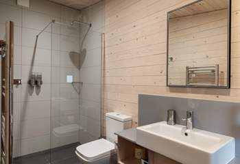 Each bedroom has its own sleek en-suite bathroom. 
