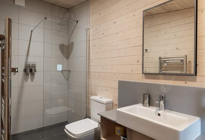 Each bedroom has its own sleek en-suite bathroom. 