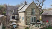 The sense of scale of Oak Tree House continues outside to the double terraces. So much space for everyone to gather, chat, play and dine.