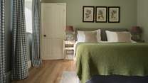 Bedroom 2 is beautifully styled and feels incredibly cosy. Once again featuring a super-king bed and total tranquility. 