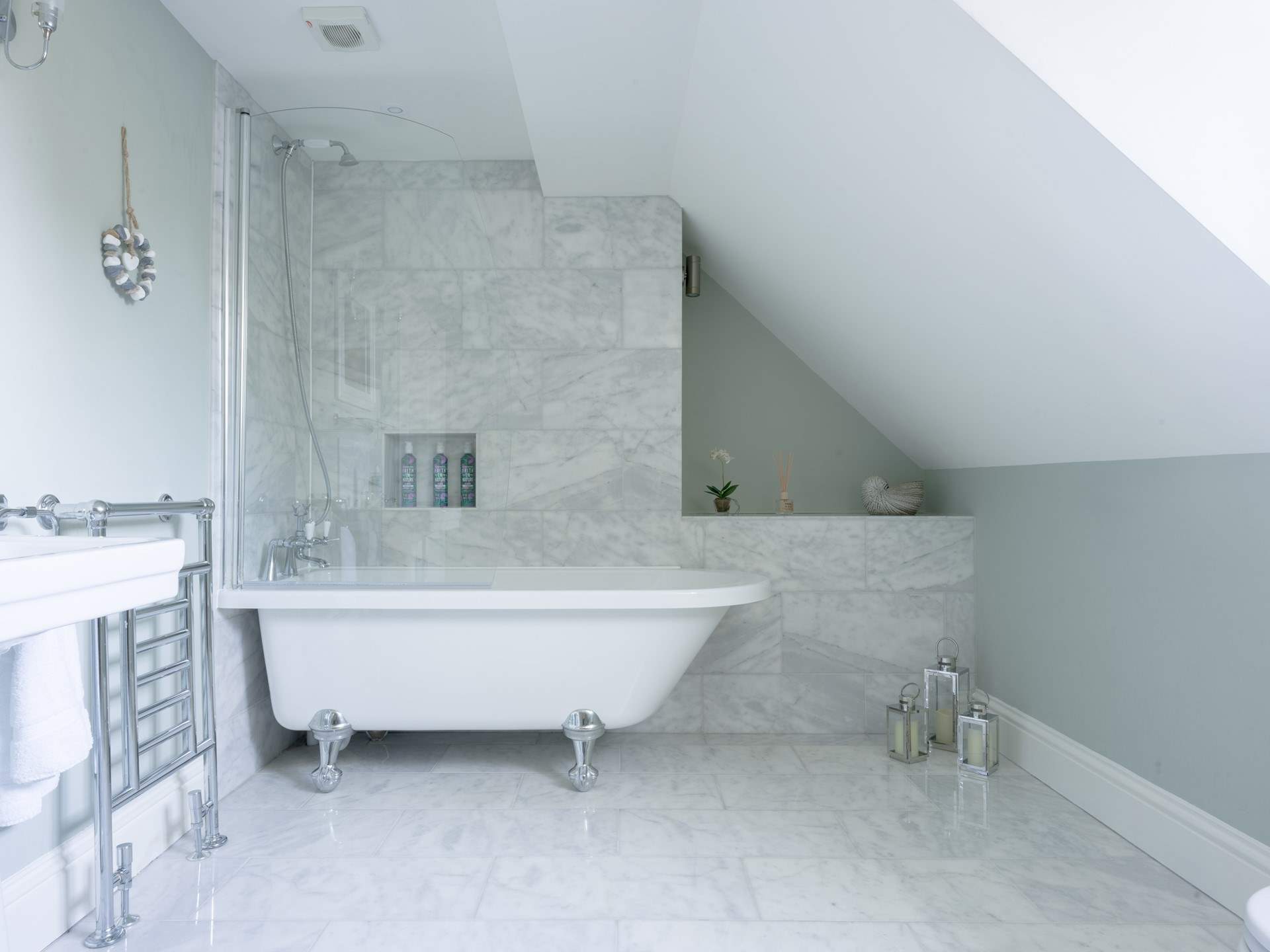 The large en suite is quite stunning. Lots of natural light, a deep bath and power shower - just perfect for getting you started or winding you down.