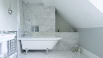 The large en suite is quite stunning. Lots of natural light, a deep bath and power shower - just perfect for getting you started or winding you down.