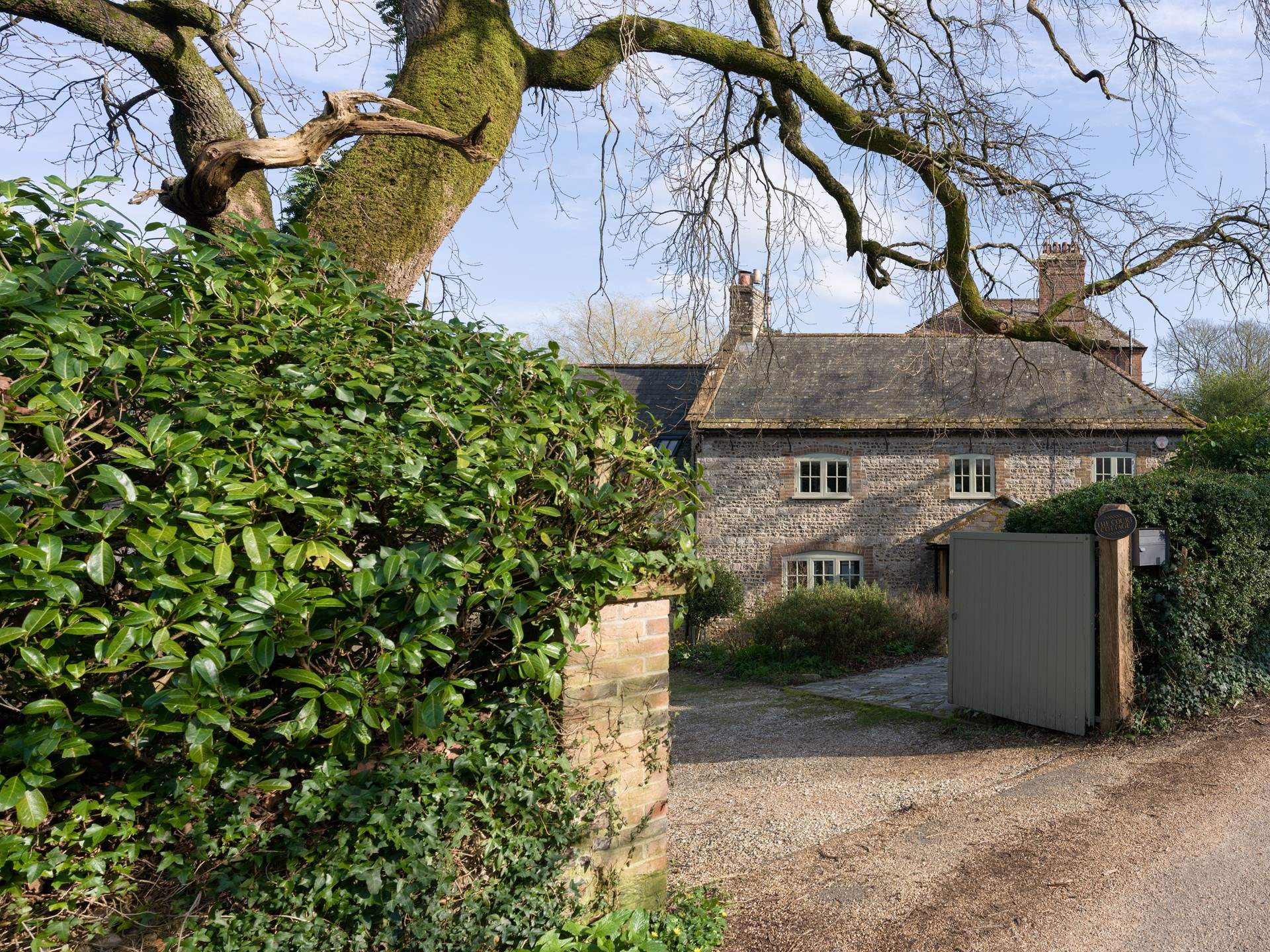 The entrance to Oak Tree House is just at the start of the private road. The double gates provide lots of privacy and security.