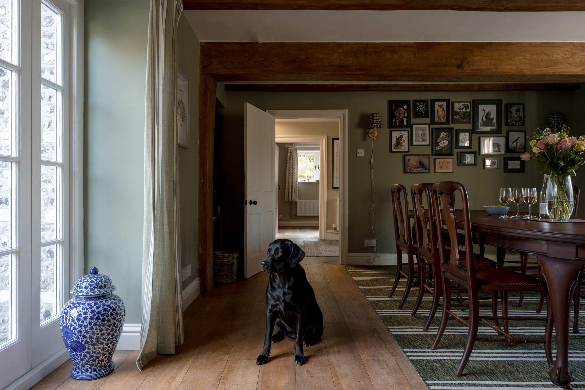 The dining-room has doors straight out to the terrace and of course your four-legged friends are more than welcome.