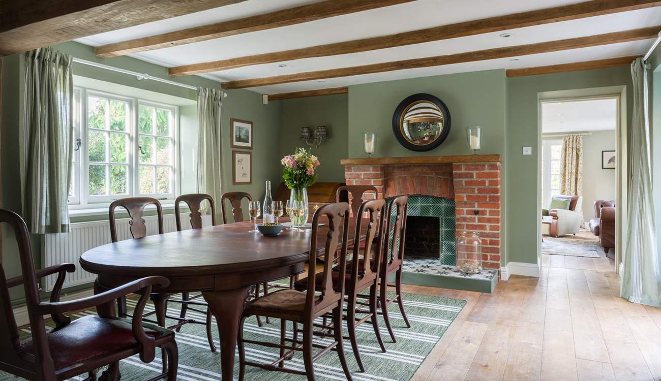 The striking dining-room is set for eight and it's dual-aspect provides the most wonderful light and atmospheric room.