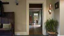 Back out into the hall you will find your way to the formal living spaces...