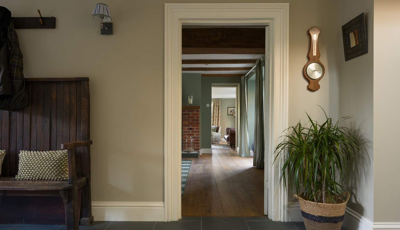 Back out into the hall you will find your way to the formal living spaces...