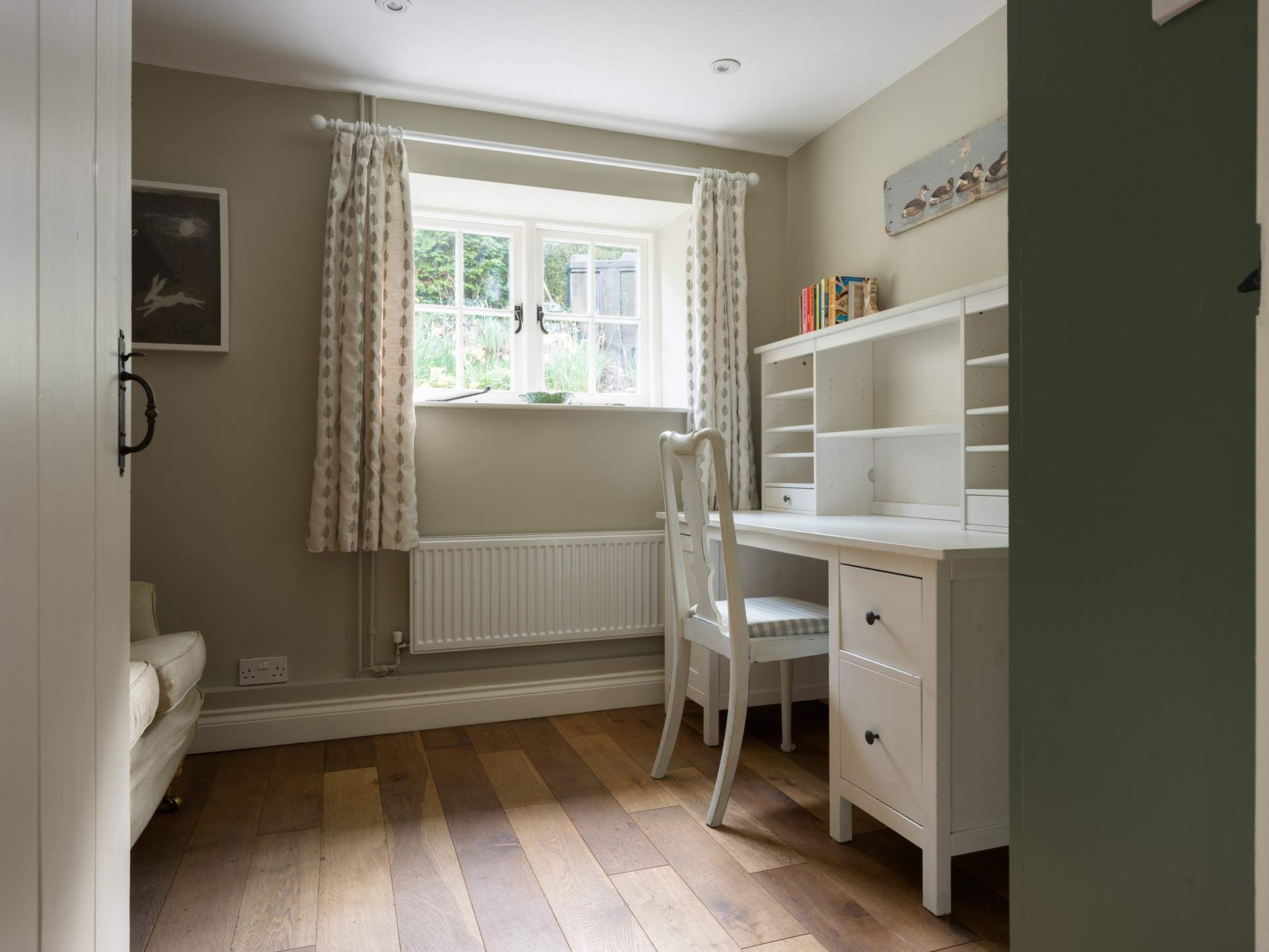 Set up as the ideal spot if you need to lock yourself away and catch-up on some work or calls.