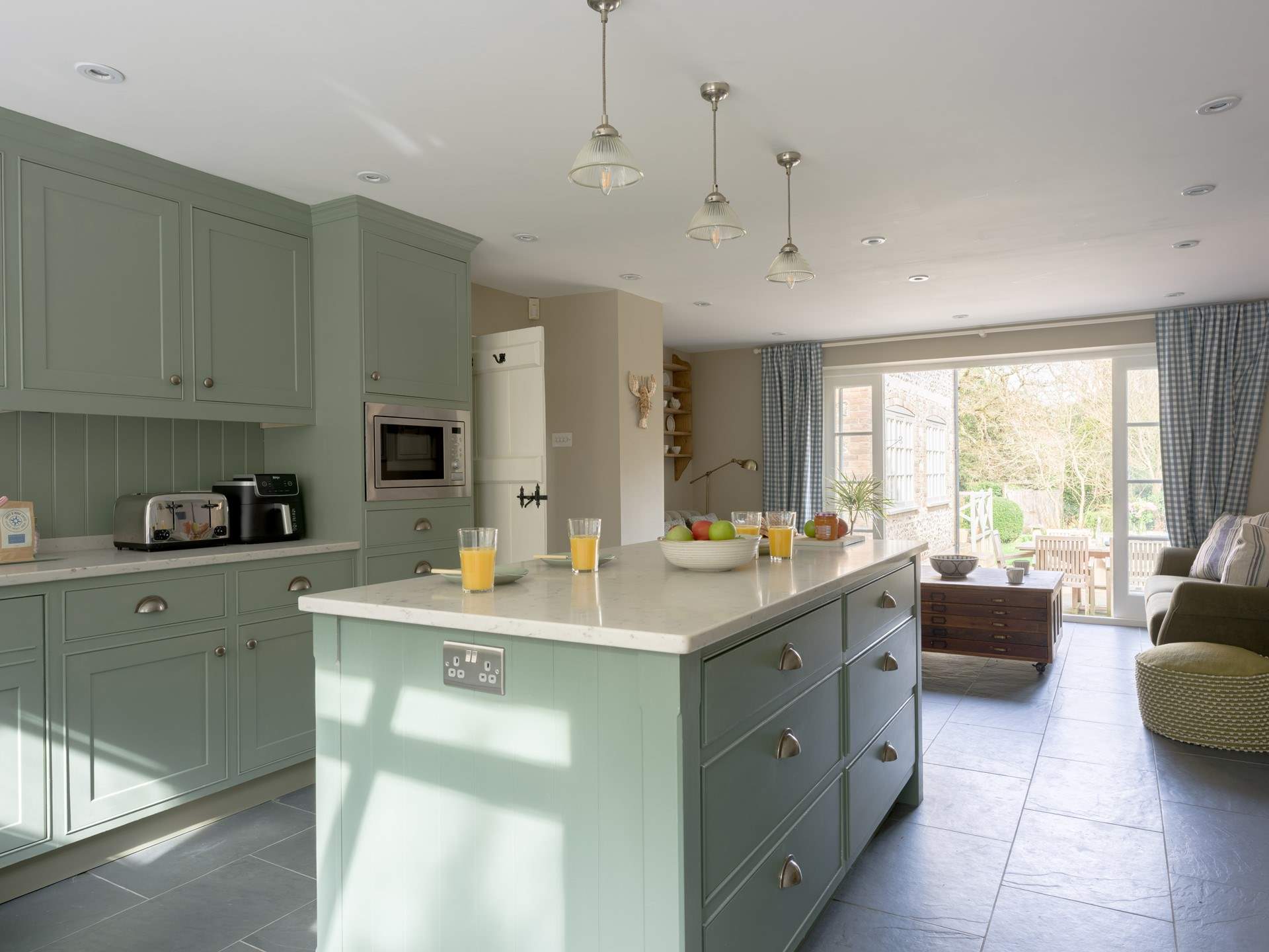 The kitchen runs right through and out onto one of terraces - it is just the most perfect socialising space.