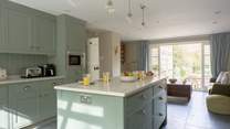 The kitchen runs right through and out onto one of terraces - it is just the most perfect socialising space.