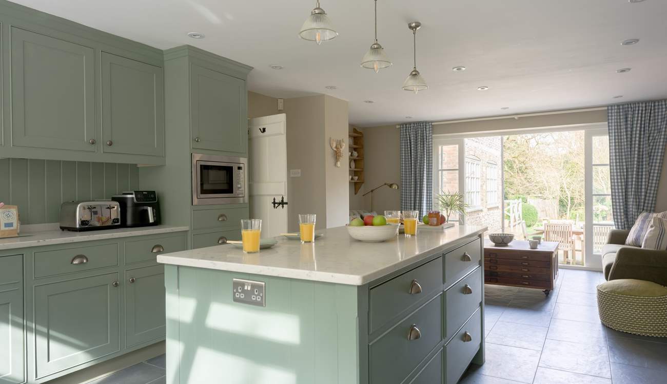 The kitchen runs right through and out onto one of terraces - it is just the most perfect socialising space.