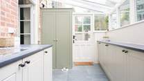 Completing the kitchen-area is this spacious utility/boot-room with washing machine, sink and plenty of storage.