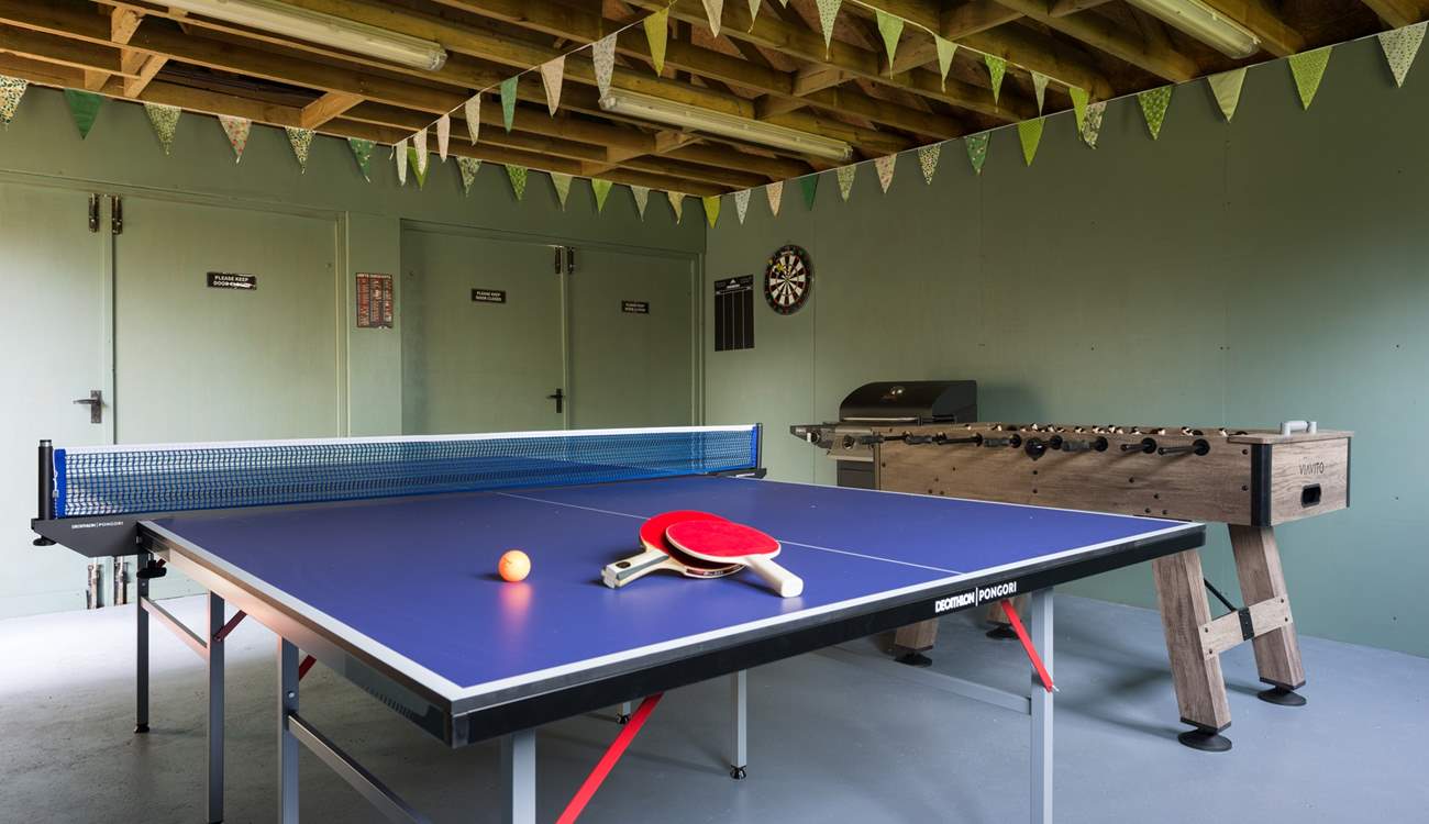 Anyone feeling competitive? Darts, table-tennis and table football on offer here in the garage space next to the house.