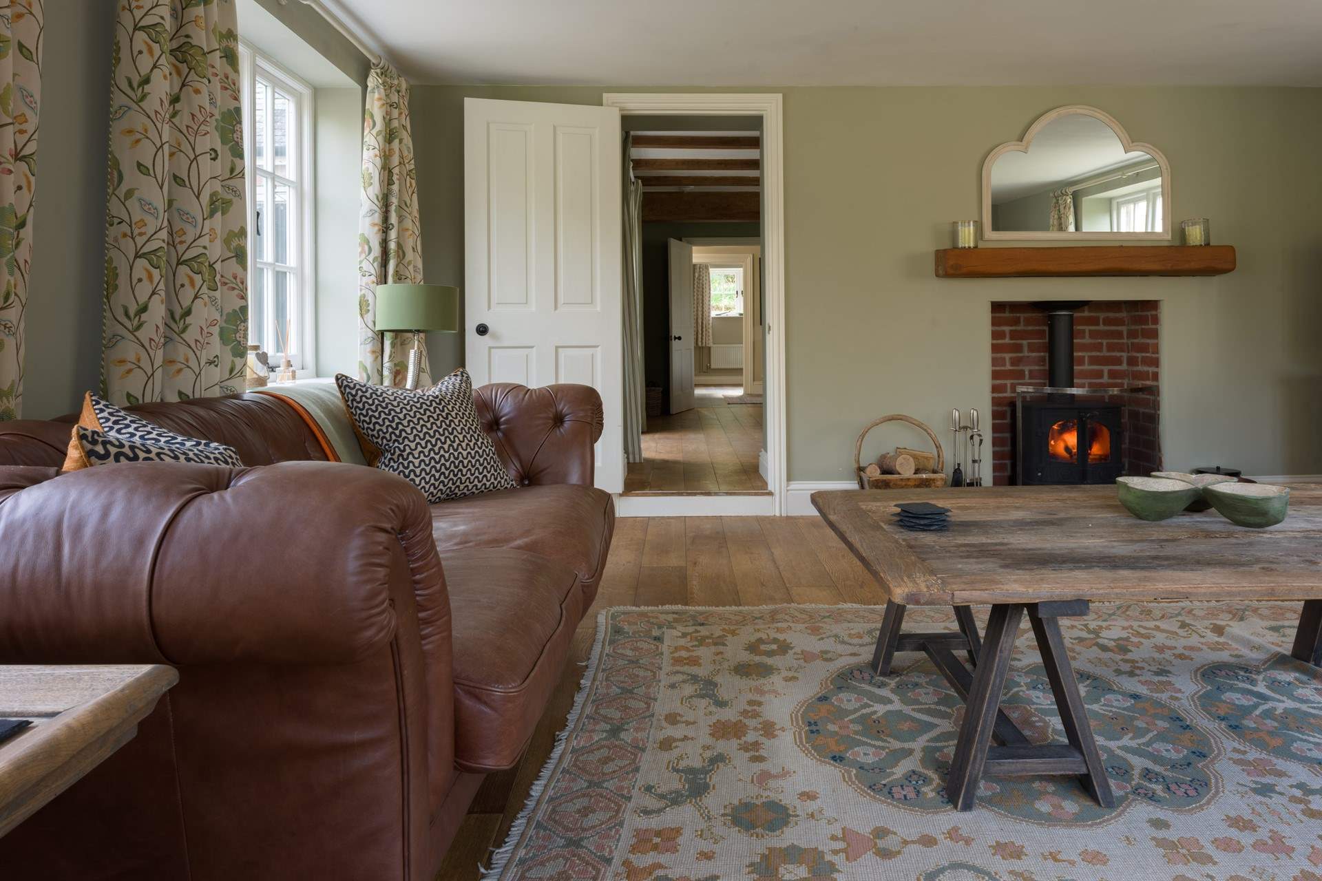 What cosy sitting-room is complete without a wonderful wood-burner? The perfect space for chilly nights in or with the doors open for those warm summer nights...