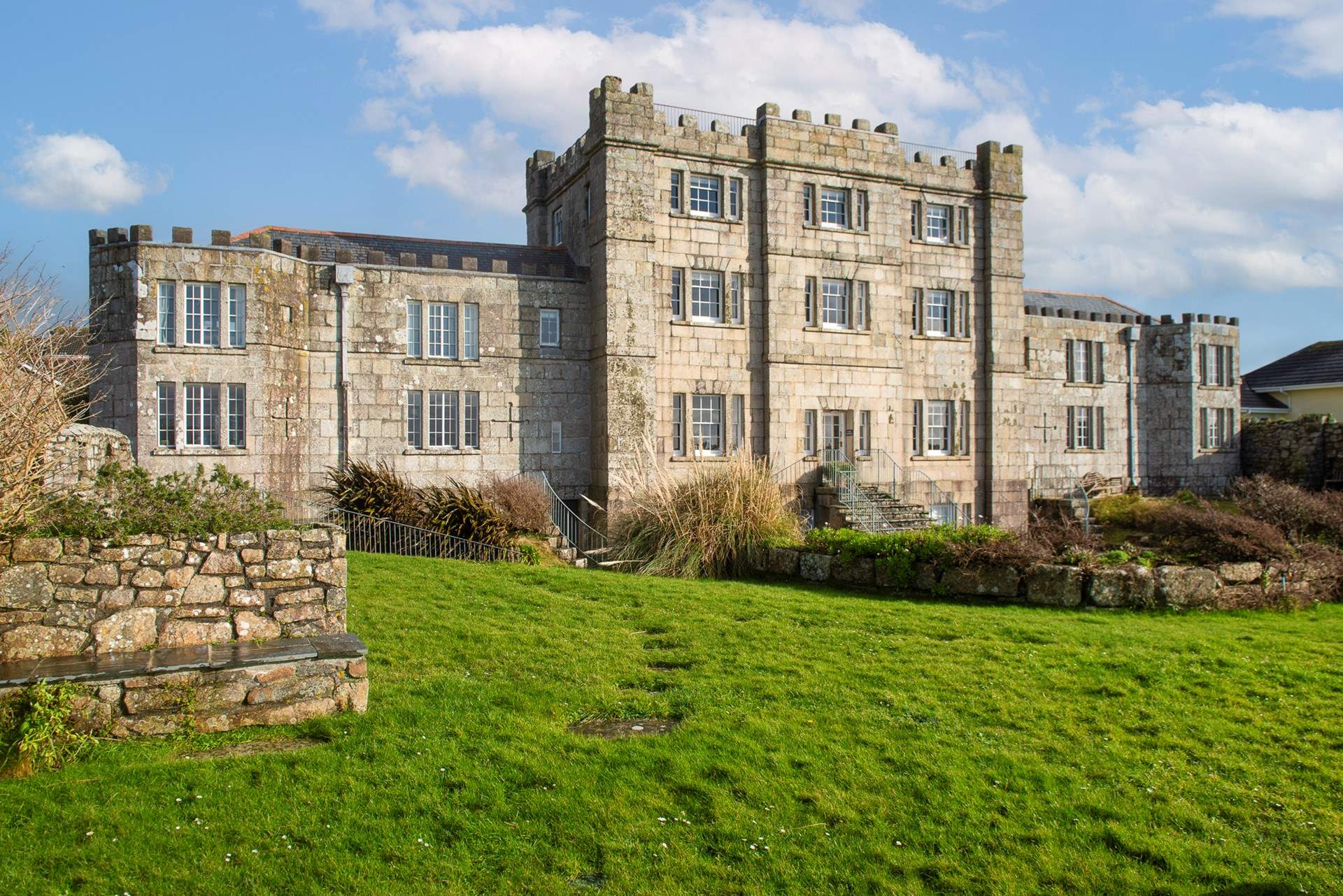 Welcome to North Wing a stunning apartment within Acton Castle with breathtaking sea views.