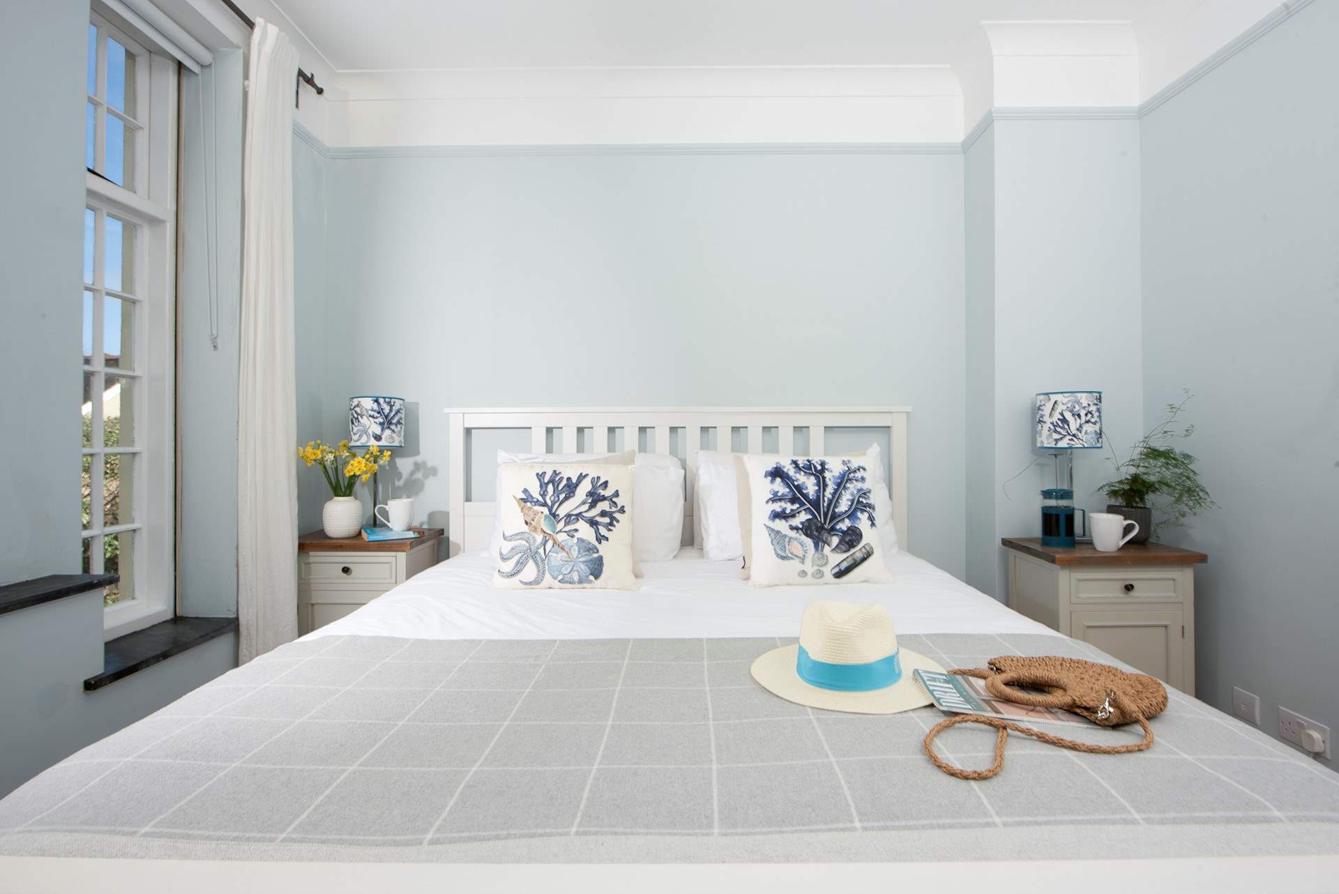 Bedroom 1 with a super-king bed is beautifully decorated, creating a calm elegant retreat.