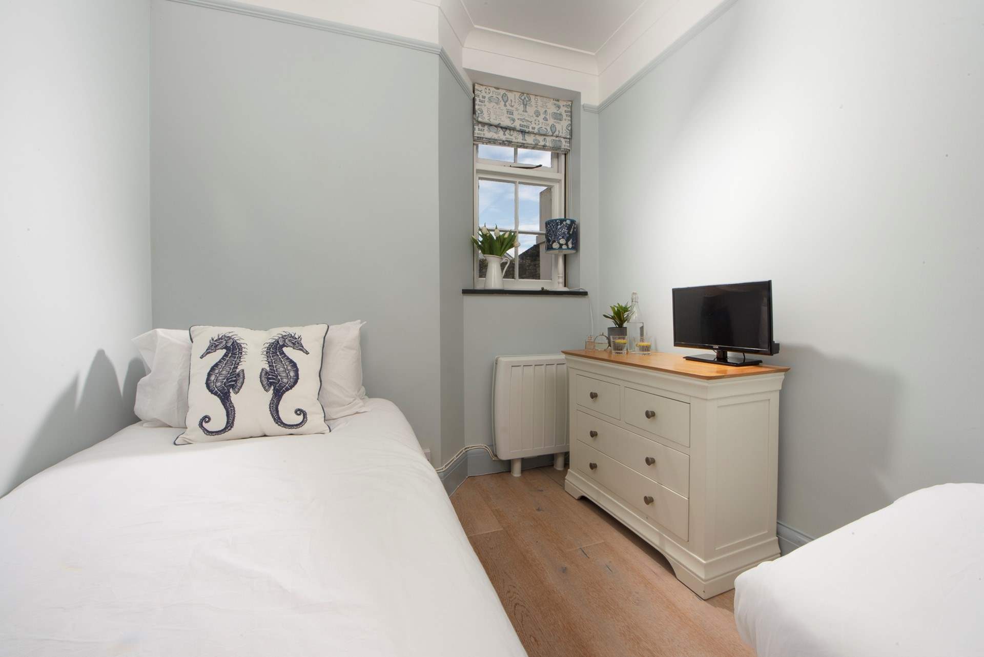 Bedroom 2 has its own TV.