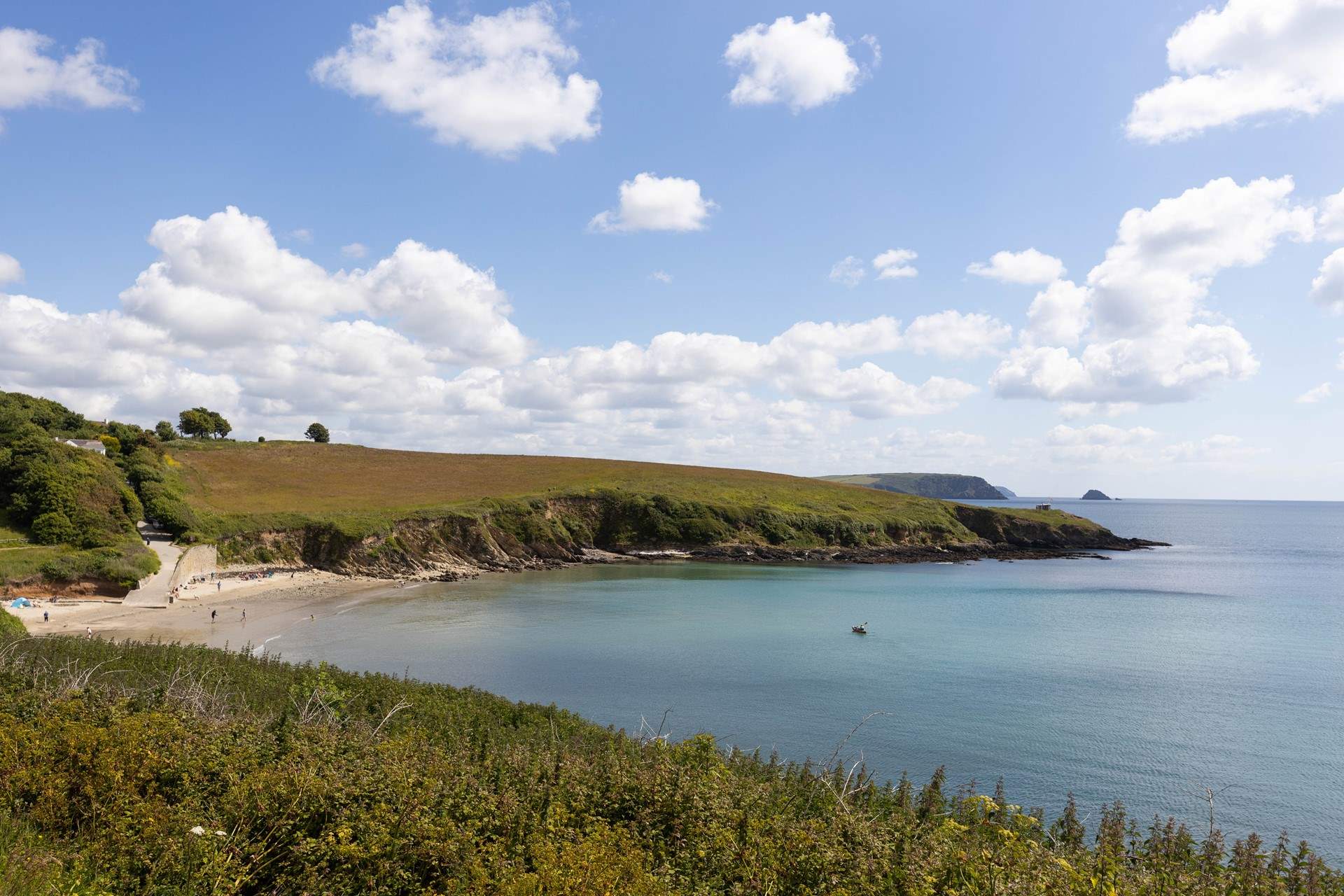 Wander along the coast path to Porthcurnick Beach and the legendary Hidden Hut. 