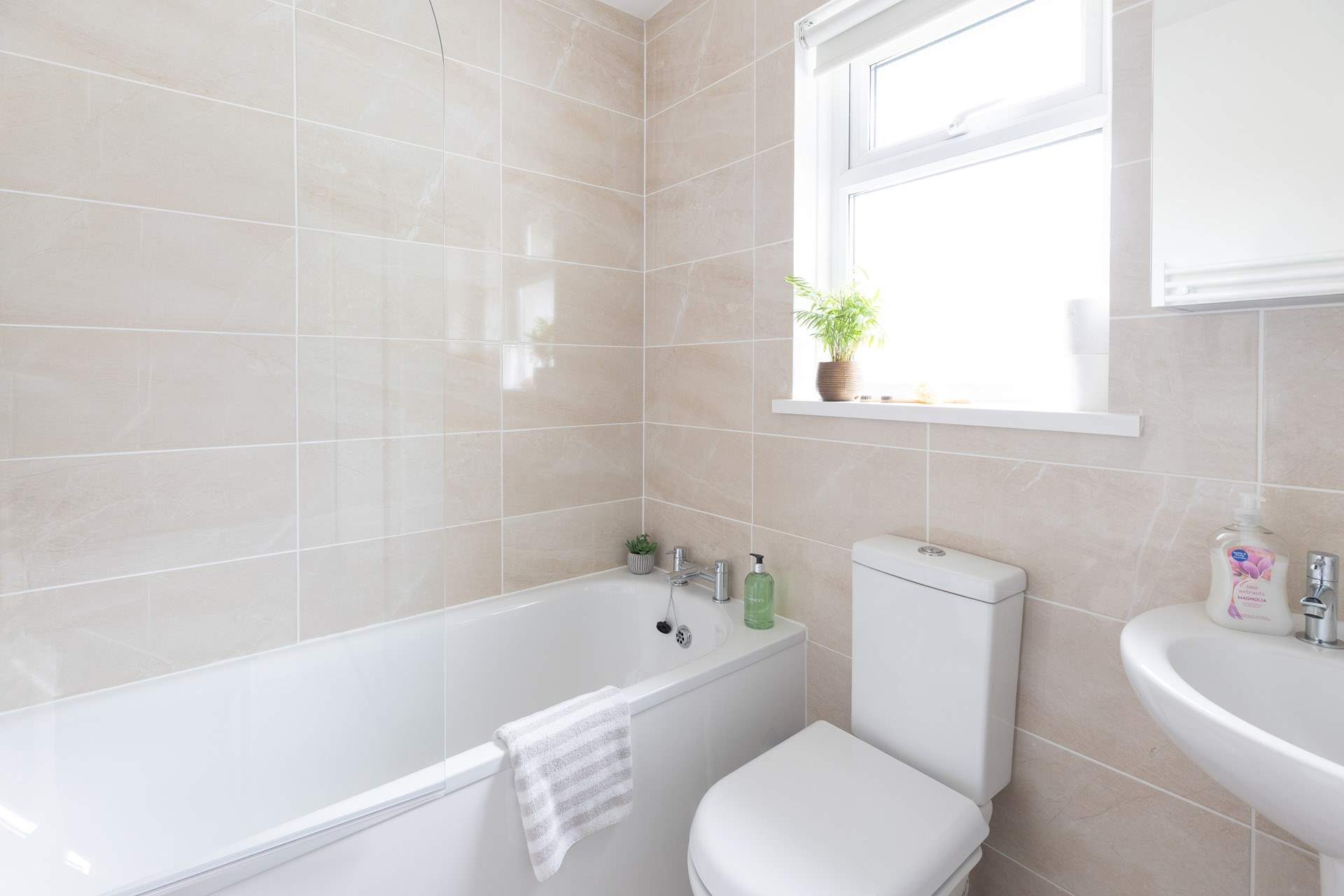 The family bathroom is light and bright.