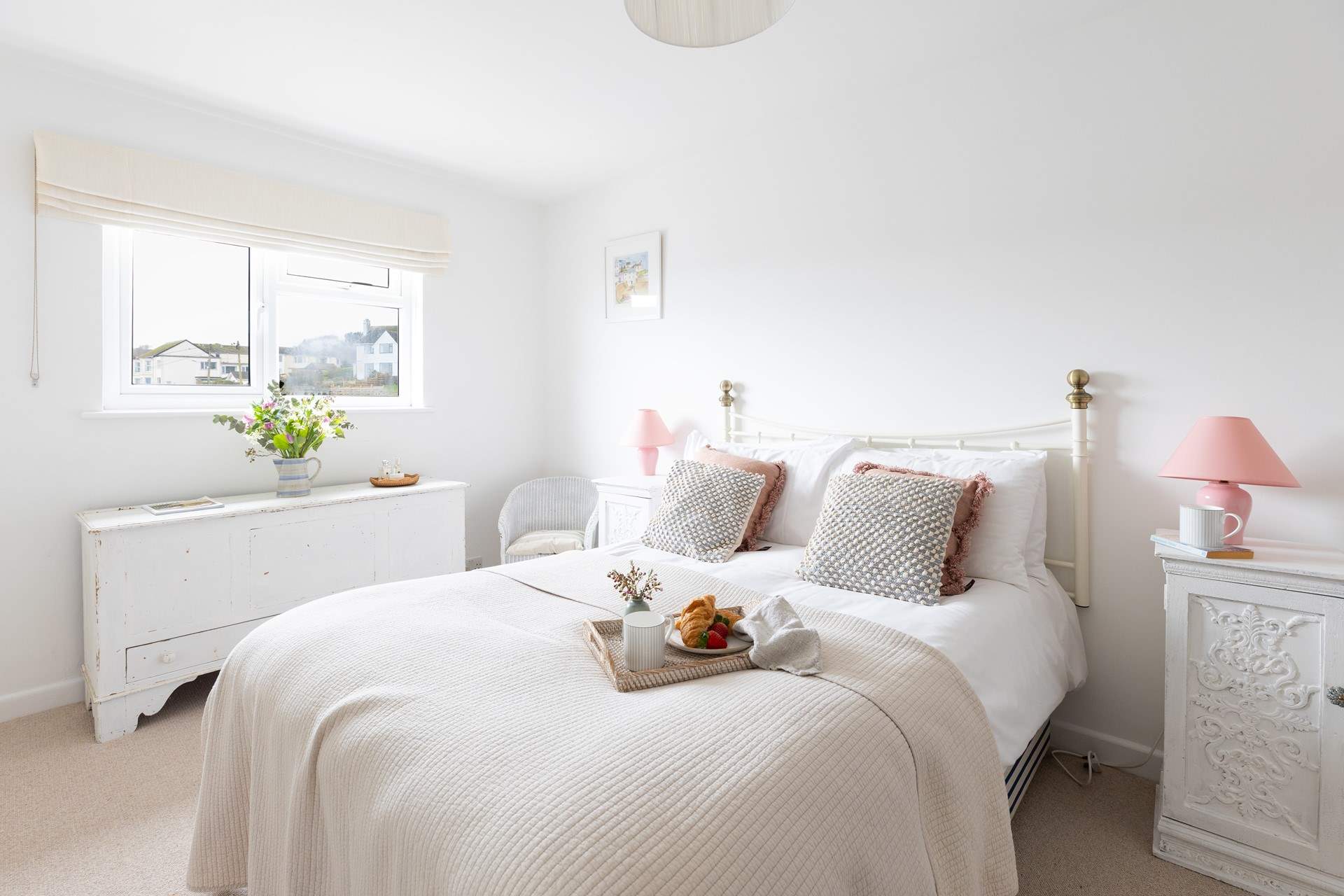 Soft pastel shades in the main bedroom. 