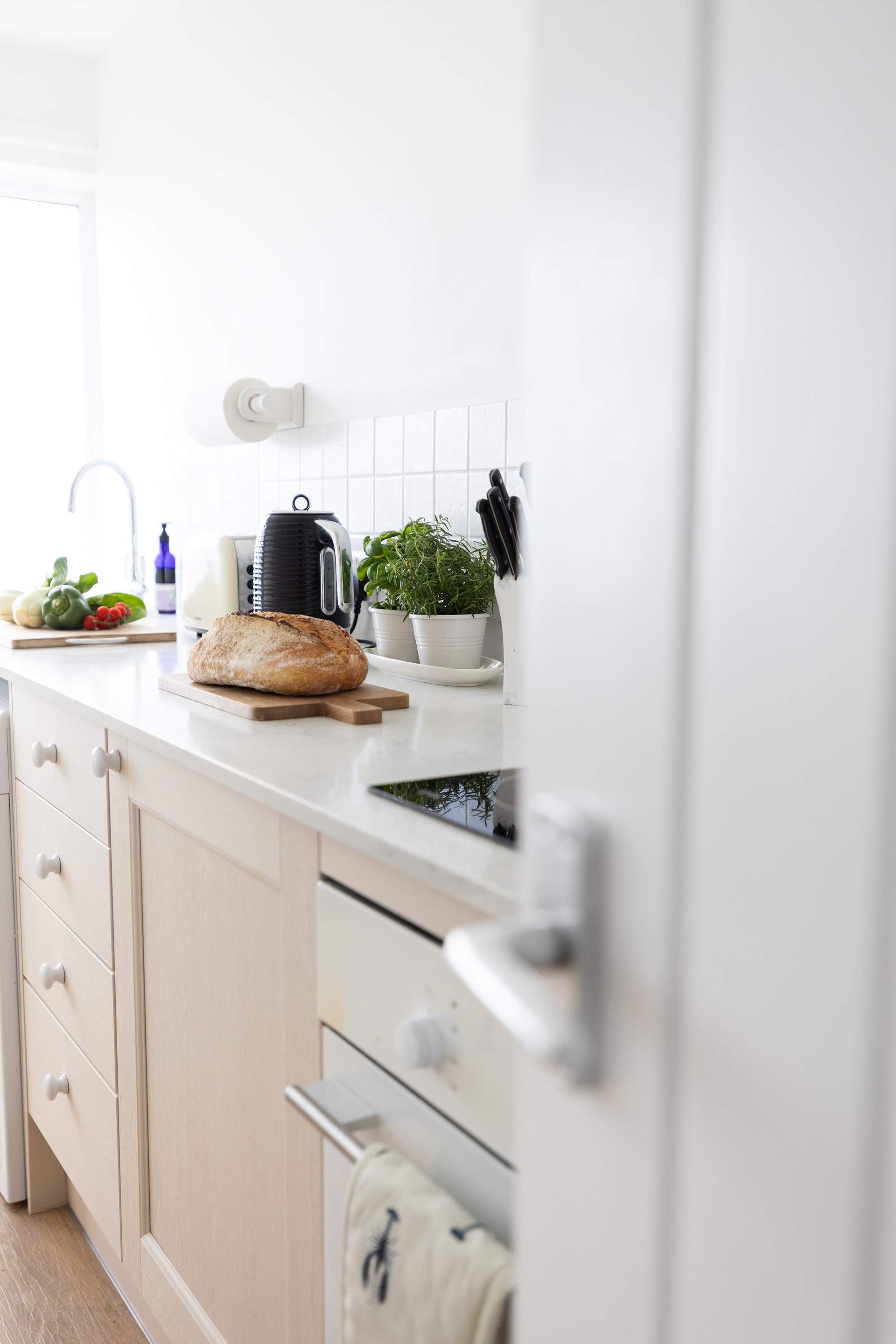 The kitchen is separate to the sitting/dining-room. 