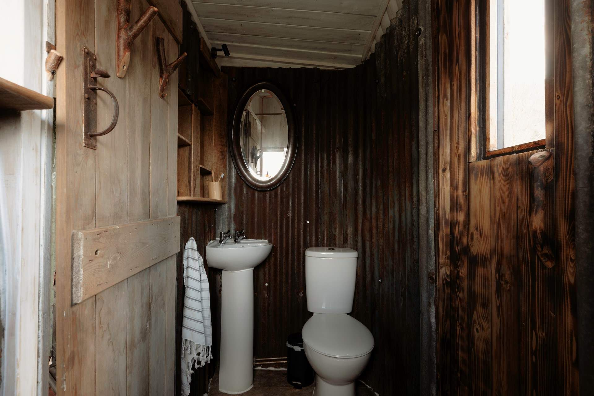 Feel refreshed in the tin-lined bathroom after a day spent exploring the countryside.