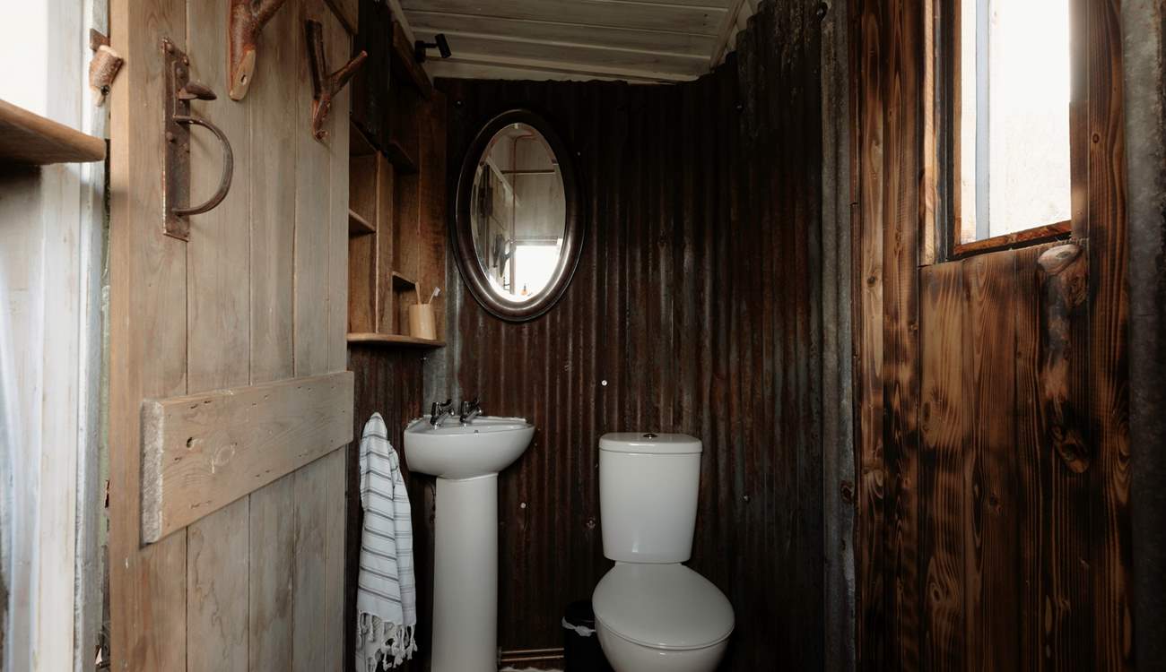 Feel refreshed in the tin-lined bathroom after a day spent exploring the countryside.