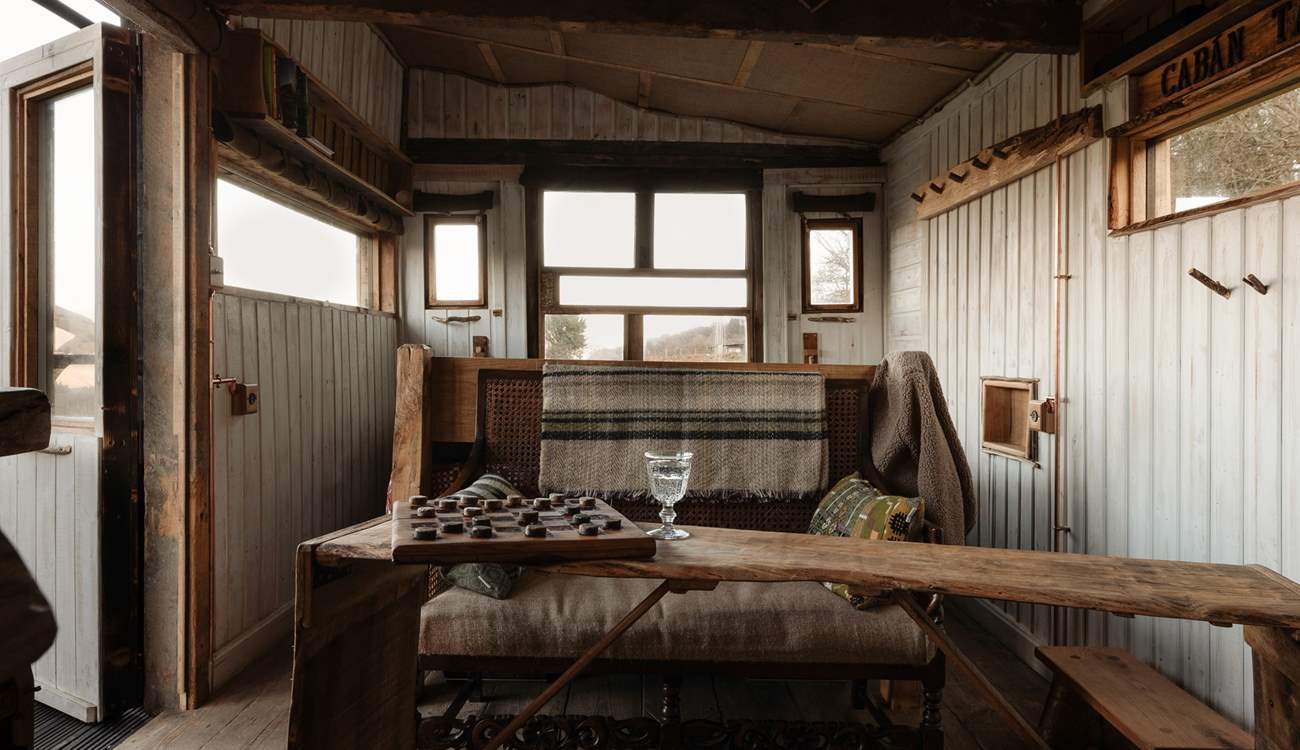 Wooden interiors and thoughtful details that give the cabin a soulful charm.