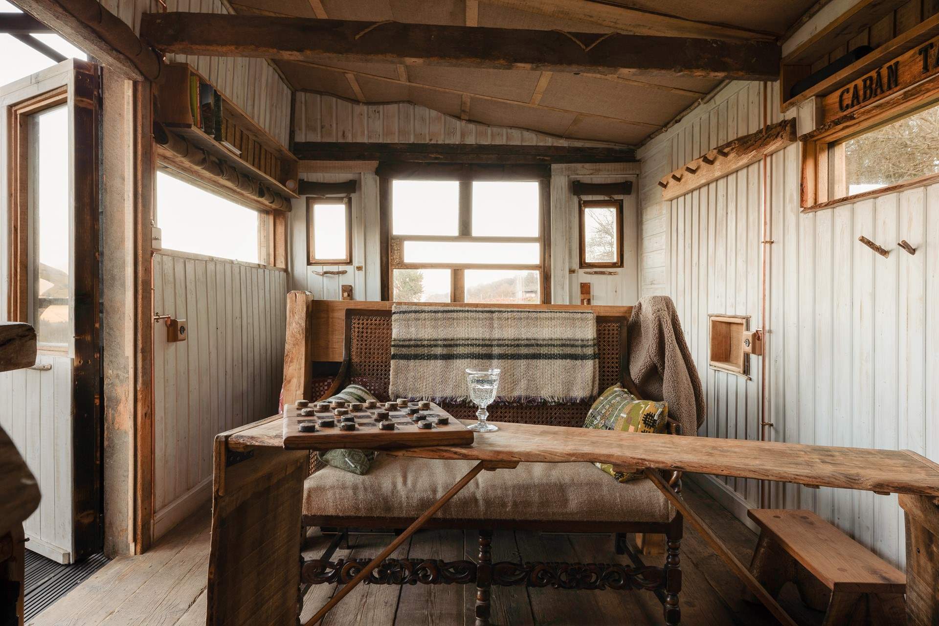 Wooden interiors and thoughtful details that give the cabin a soulful charm.
