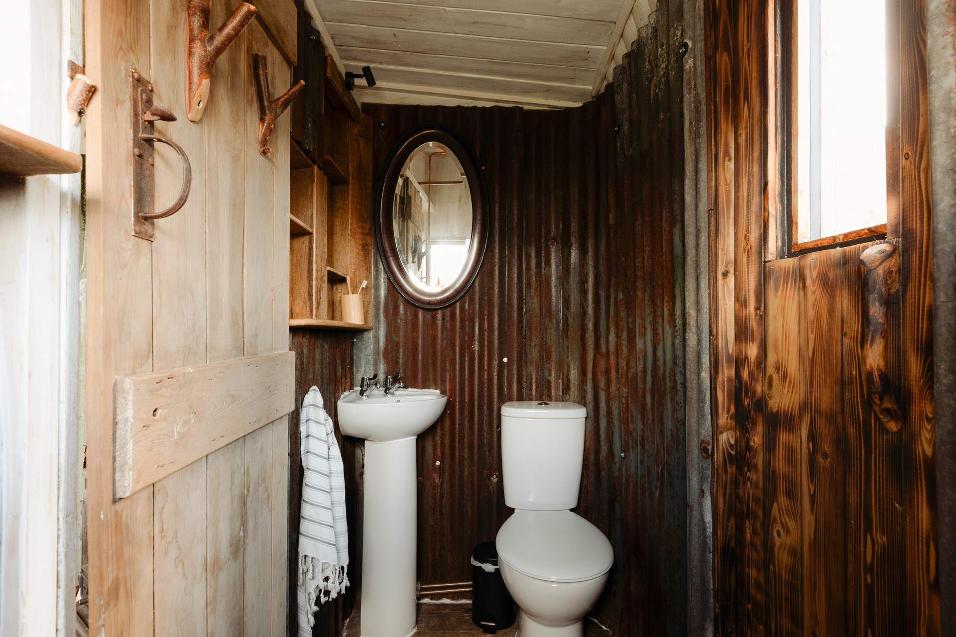 Feel refreshed in the tin-lined bathroom after a day spent exploring the countryside.