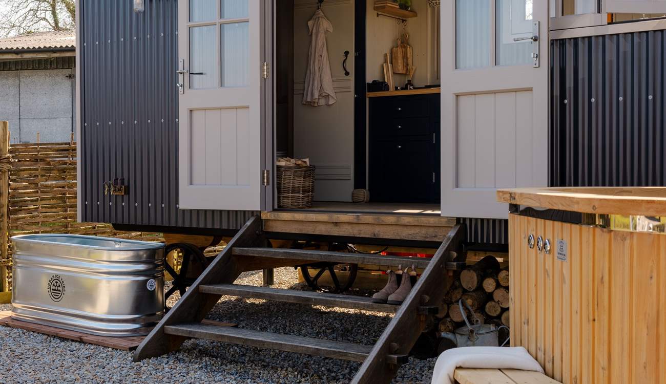 Move between the soothing hot tub and the cold plunge bath for a true wellness experience.
