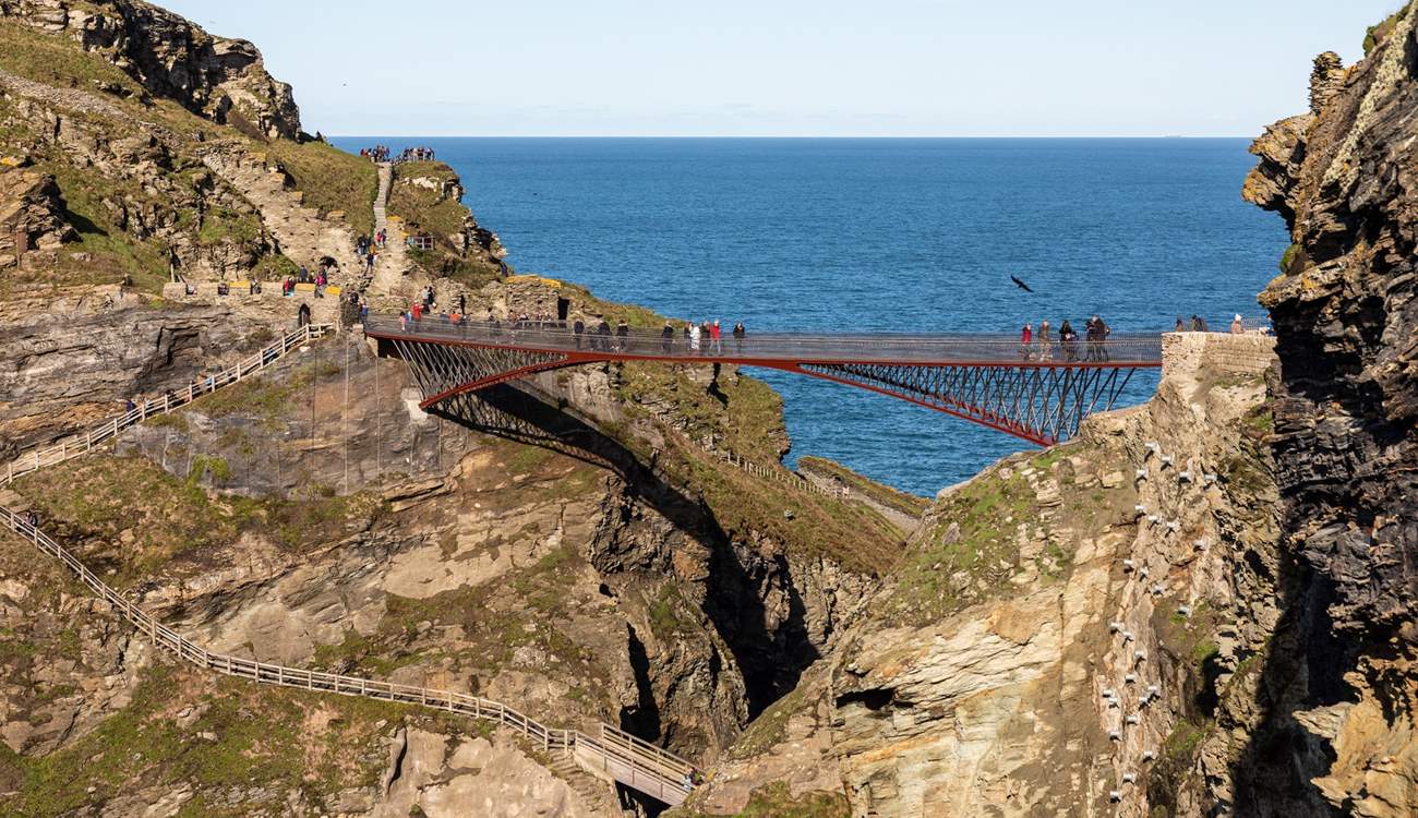 Discover the dramatic cliffs of Tintagel and cross the famous footbridge. 