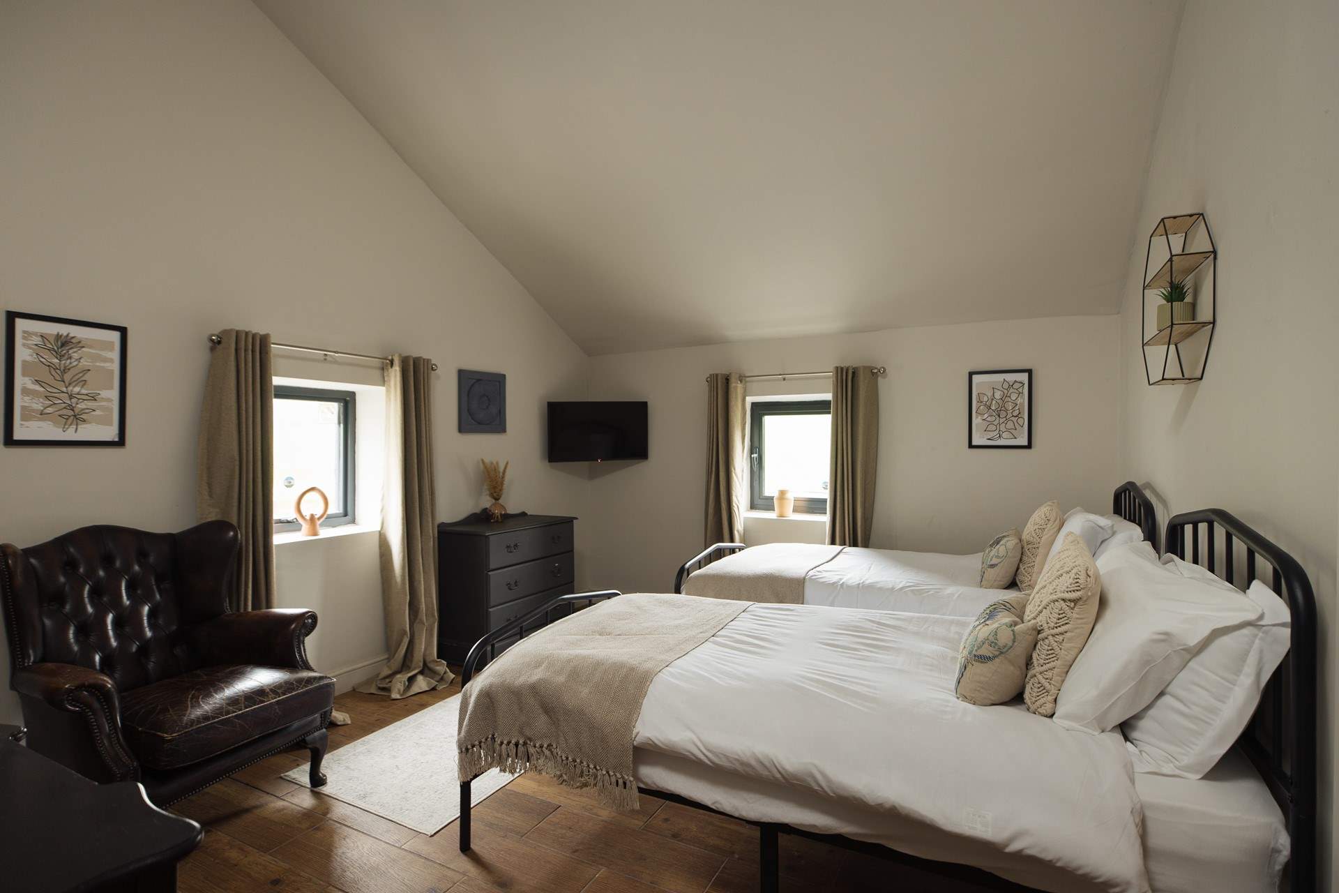 Calming hues of the twin room in The Coach House. 