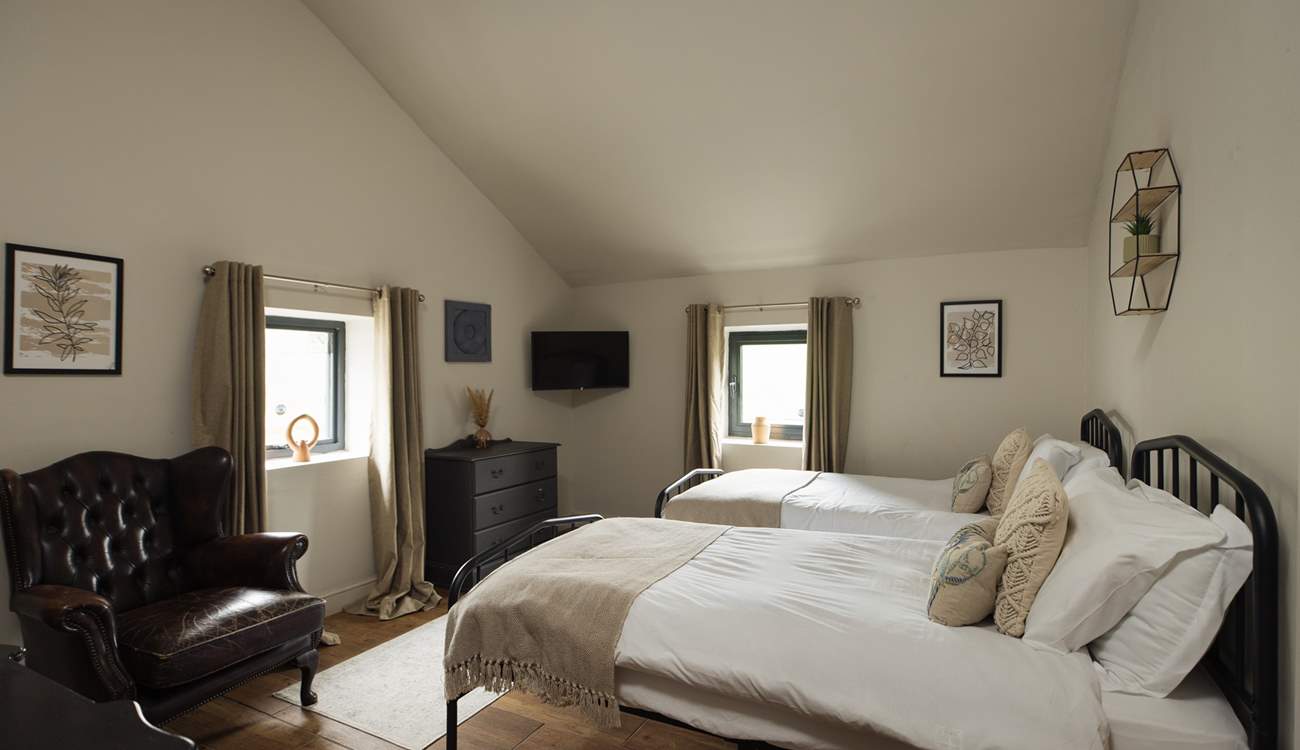 Calming hues of the twin room in The Coach House. 