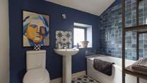 Take a hot, relaxing bath after a day's exploring in the en suite in The Coach House. 