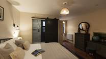 Quiet indulgence in the ground floor bedroom in The Stables. 