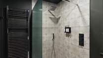 Soothing hot shower after hiking in the mountains. 