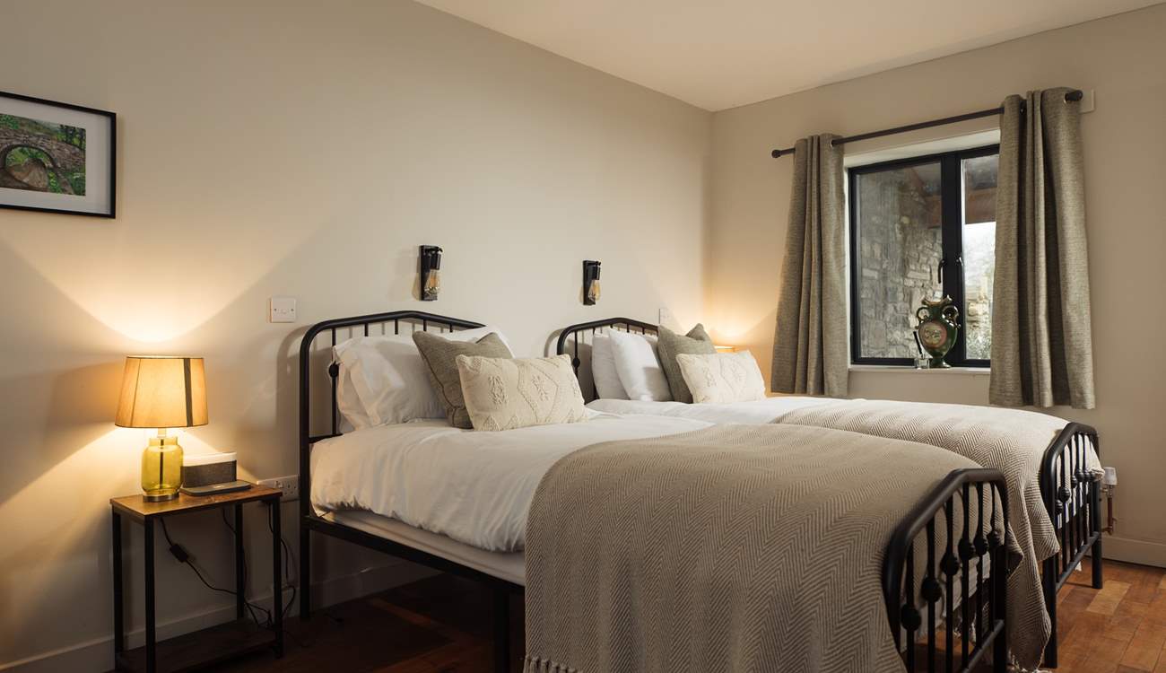 Stylish ground floor twin room in The Stables.