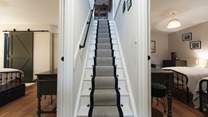 Stairs leading to the first floor in The Stables. 